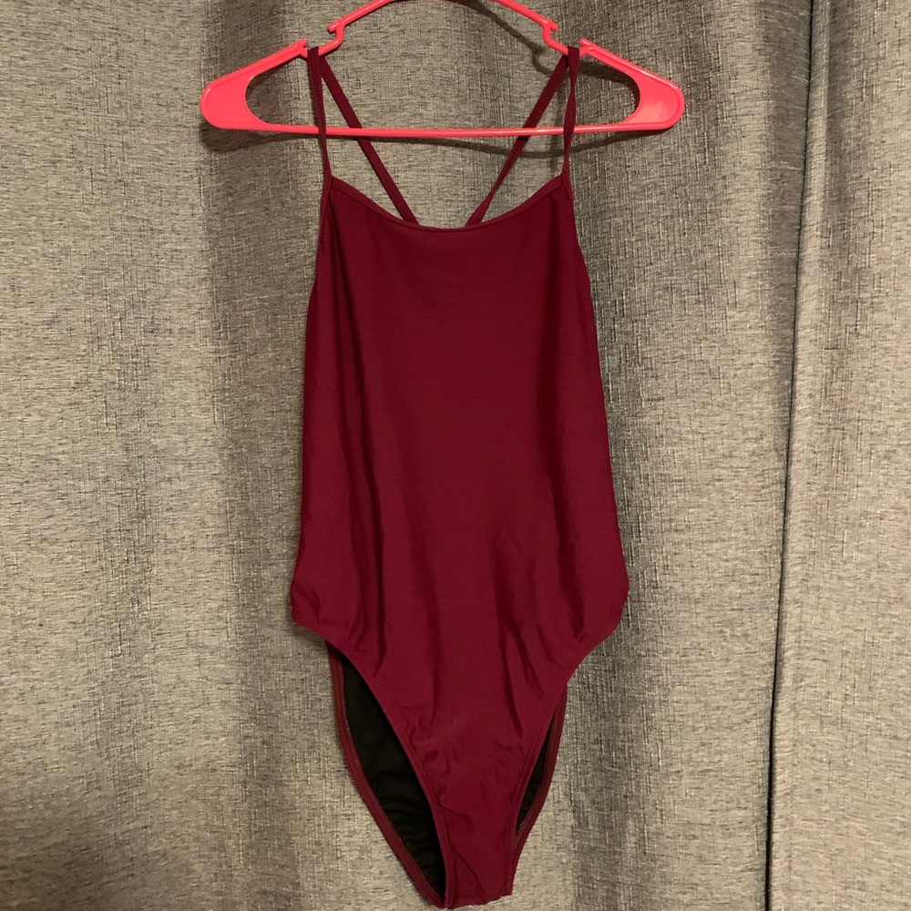 NWOT Jolyn Perry onesie in cabernet. Size 36